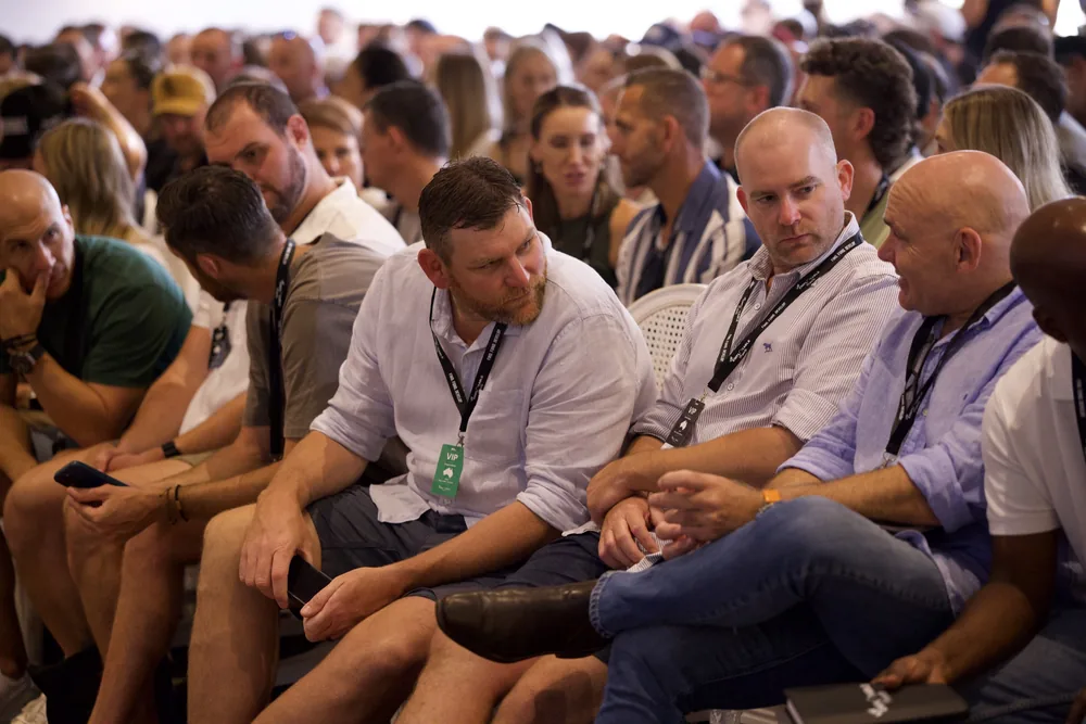 A row of attendees leaning in during a session at FFD LIVE